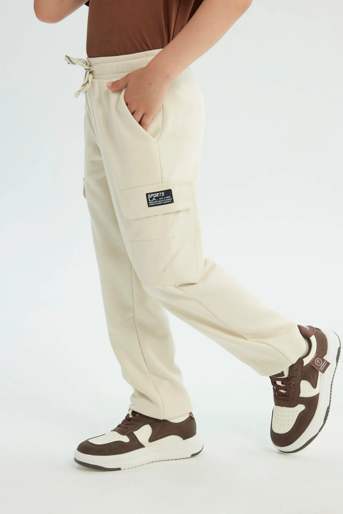 Pantalón Buzo Niño Pitillo Beige - Image 2