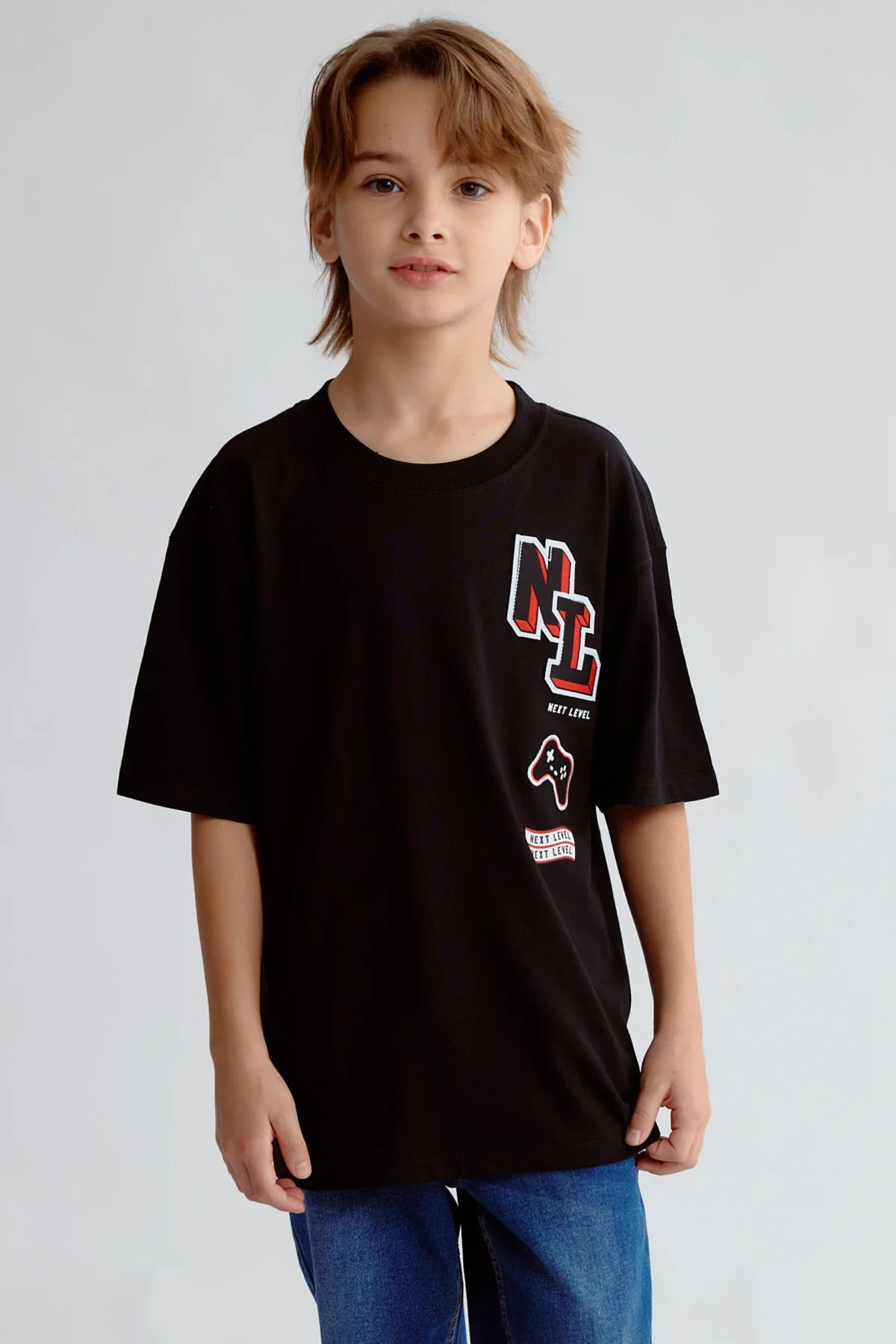 Polera Niño Bordado y Parche Naranjo