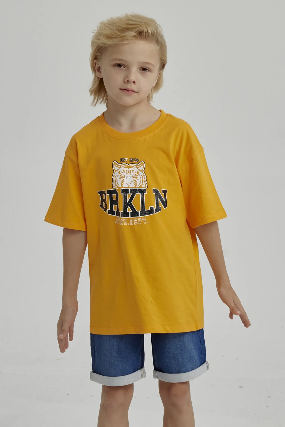 Polera Niño Print Posicional Naranjo